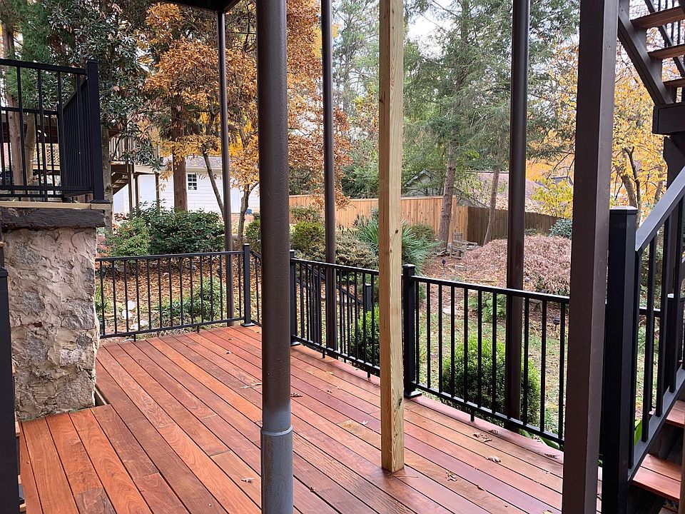 Deck with view of landscaped yard