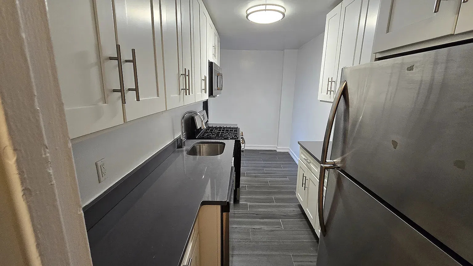 212-08 75th Avenue — Photo 3