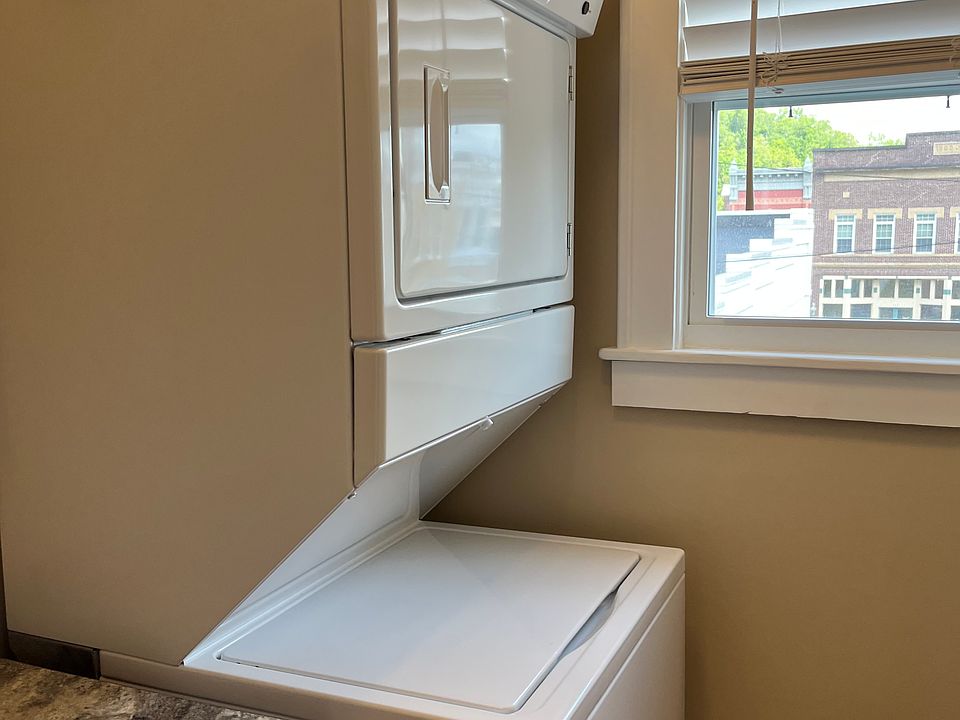 Nice laundry room with stackable washer and dryer