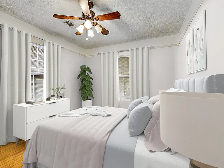 Spacious front bedroom. Fits Queen sized bed and plenty of other furniture. No furniture included.