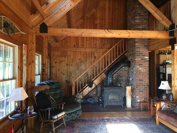 living room with wood-burning stove