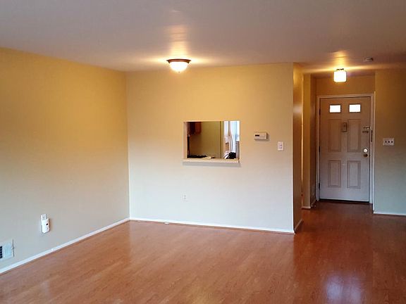 Dining area with window to kitchen
