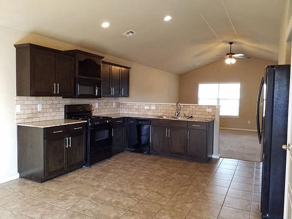 View from kitchen into living room 