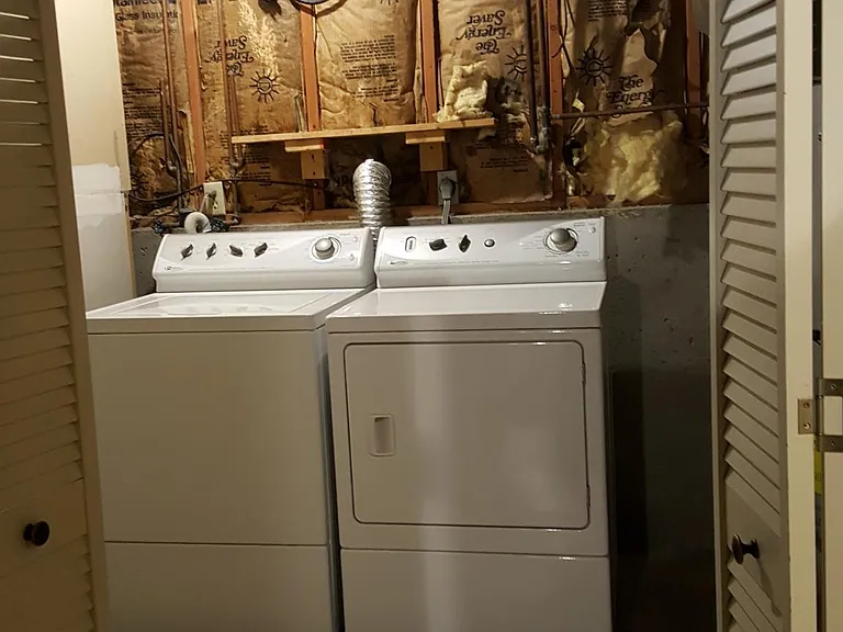 Laundry room located downstairs, washer and dryer provided