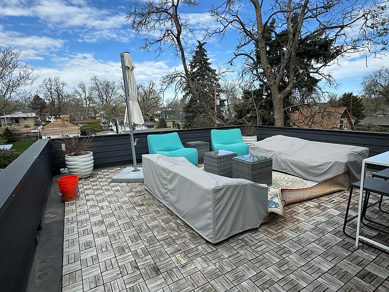 Roof deck! Huge - there are two 84" couches and multiple chairs in the photo.