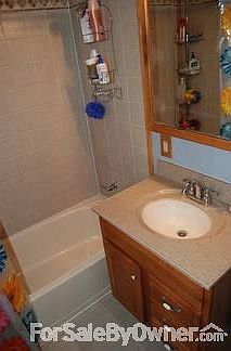 Upstairs bathroom
						:
						All ceramic tile in shower/tub and floor, updated cabinets/sink/toilet