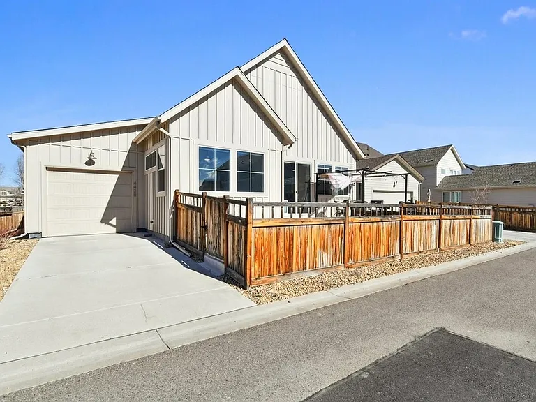 Separate back driveway via alley with access to back yard. Backyards are separate from neighbors by driveways.