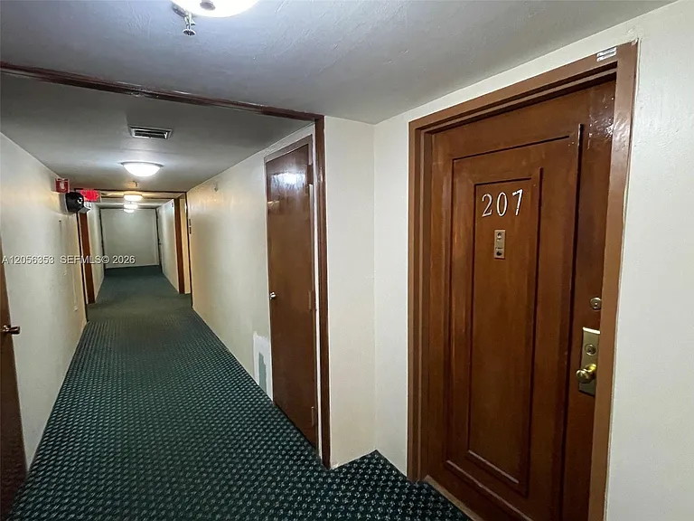671 NE 195th St #207 — Photo 31
