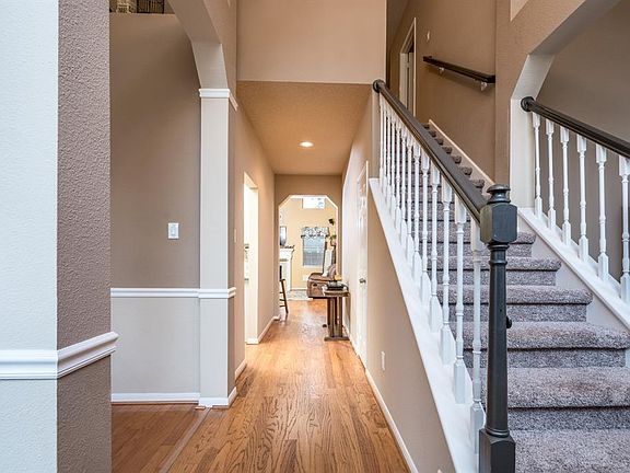 Welcome home! Neutral colors, wood floors throughout downstairs and tall ceilings.