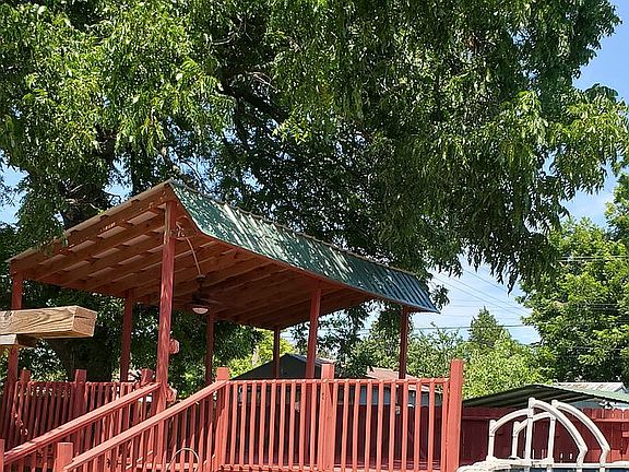 Covered Deck wraps pool