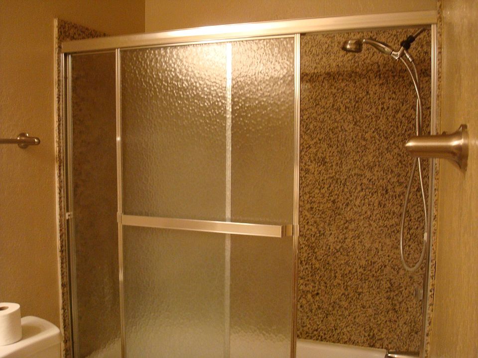 Central Bathroom with Granite Enclosure