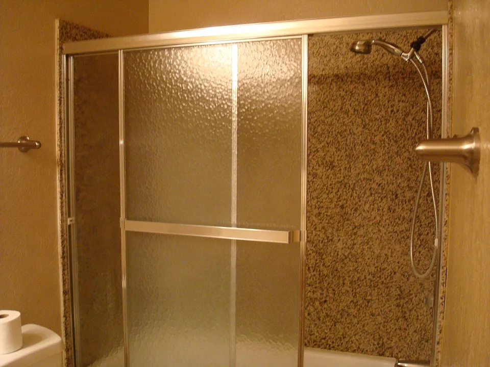 Central Bathroom with Granite Enclosure