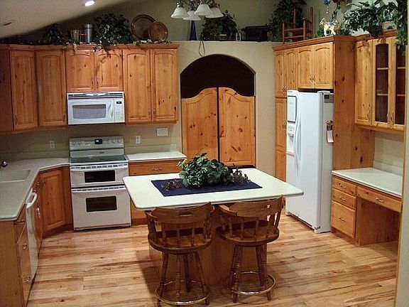 Custom Kitchen with lots of cabinets and pantry