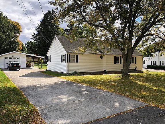 Detached garage and car port