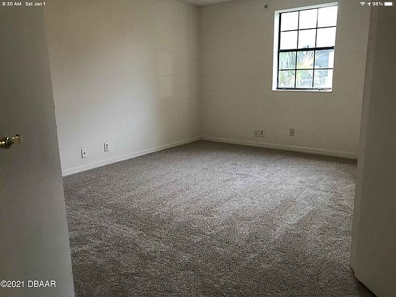 Master bedroom has a double-door entry and has a private bathroom with tub