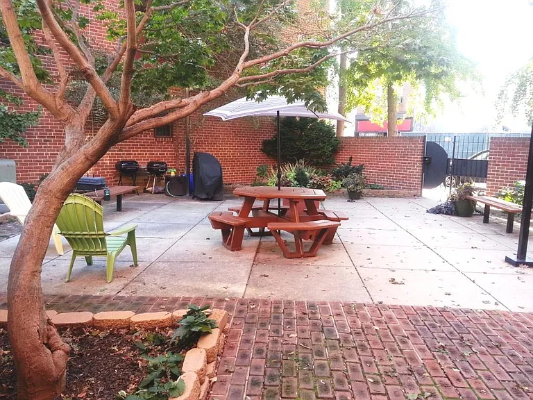 Your bedroom windows also overlook this lovely garden/patio, which you are quite welcome to use.