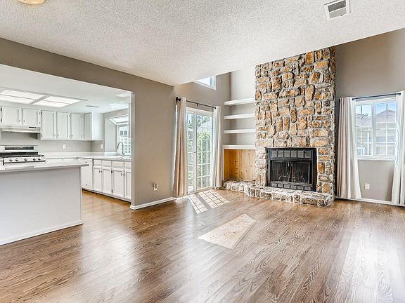 Natural wood fireplace, outdoor dining and open floor concept!