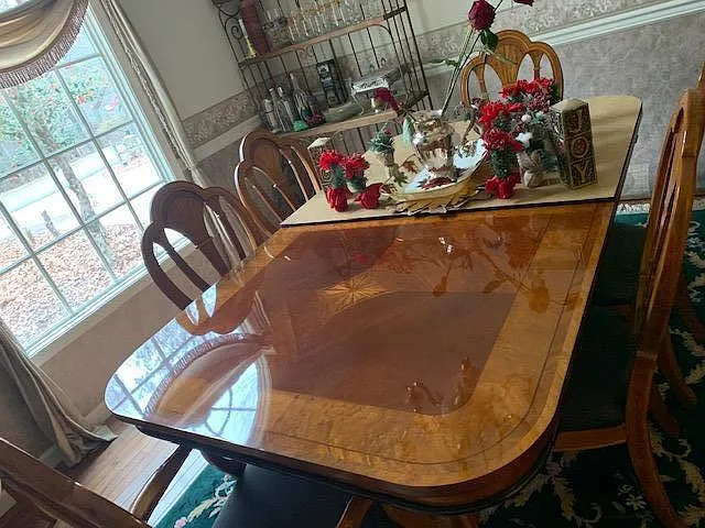 FORMAL DINING ROOM WITH NEW PIANO