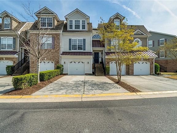 Attached Garage and Driveway Parking. 