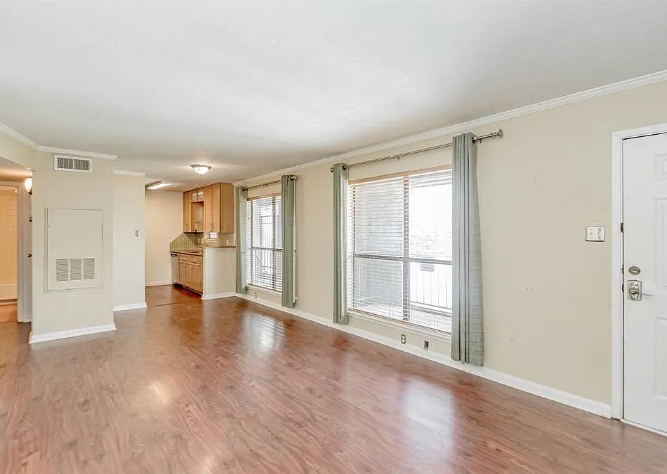 Living room with view of kitchen