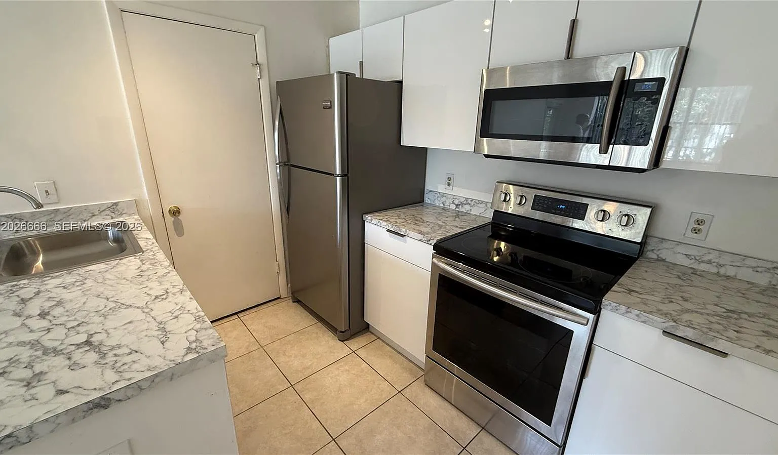 Palm Aire Gardens Condo — Photo 1