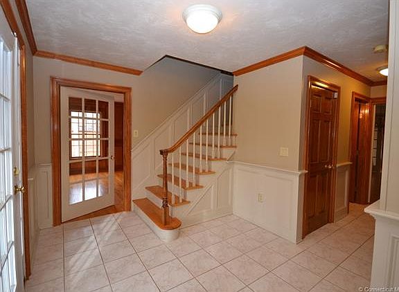  Bright Foyer opens to Libr...