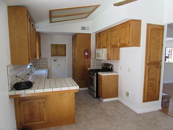 kitchen with laundry room 