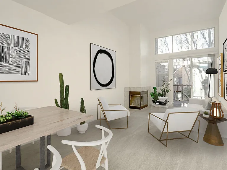 Living Room with Fireplace and Balcony