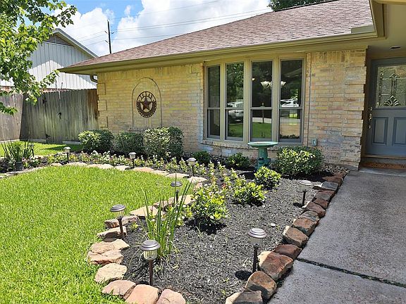 Fresh landscaping in place. Landscape lighting in front yard.