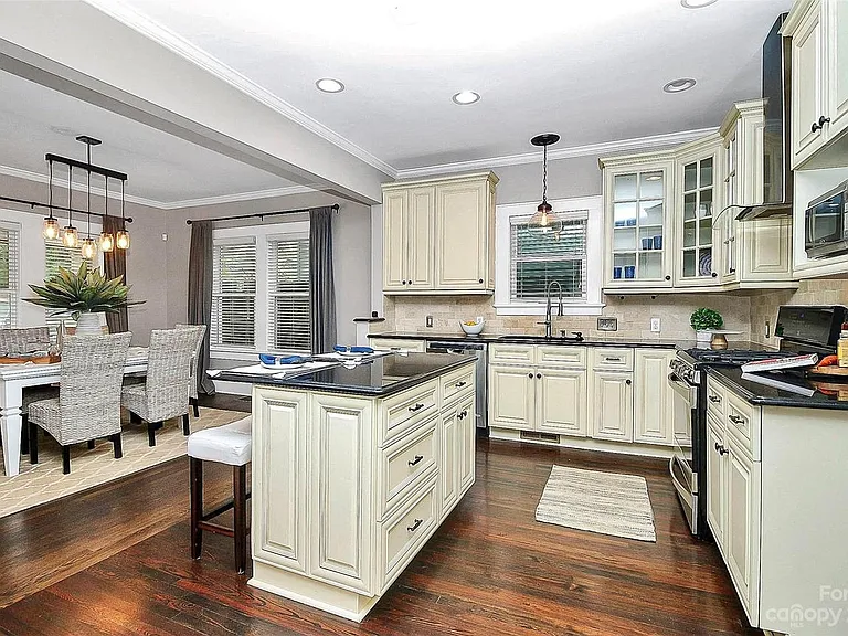Open kitchen with large island, ideal for bar stool snacking