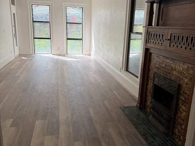 The living room is huge and can be separated with furniture to include an office or separate space.