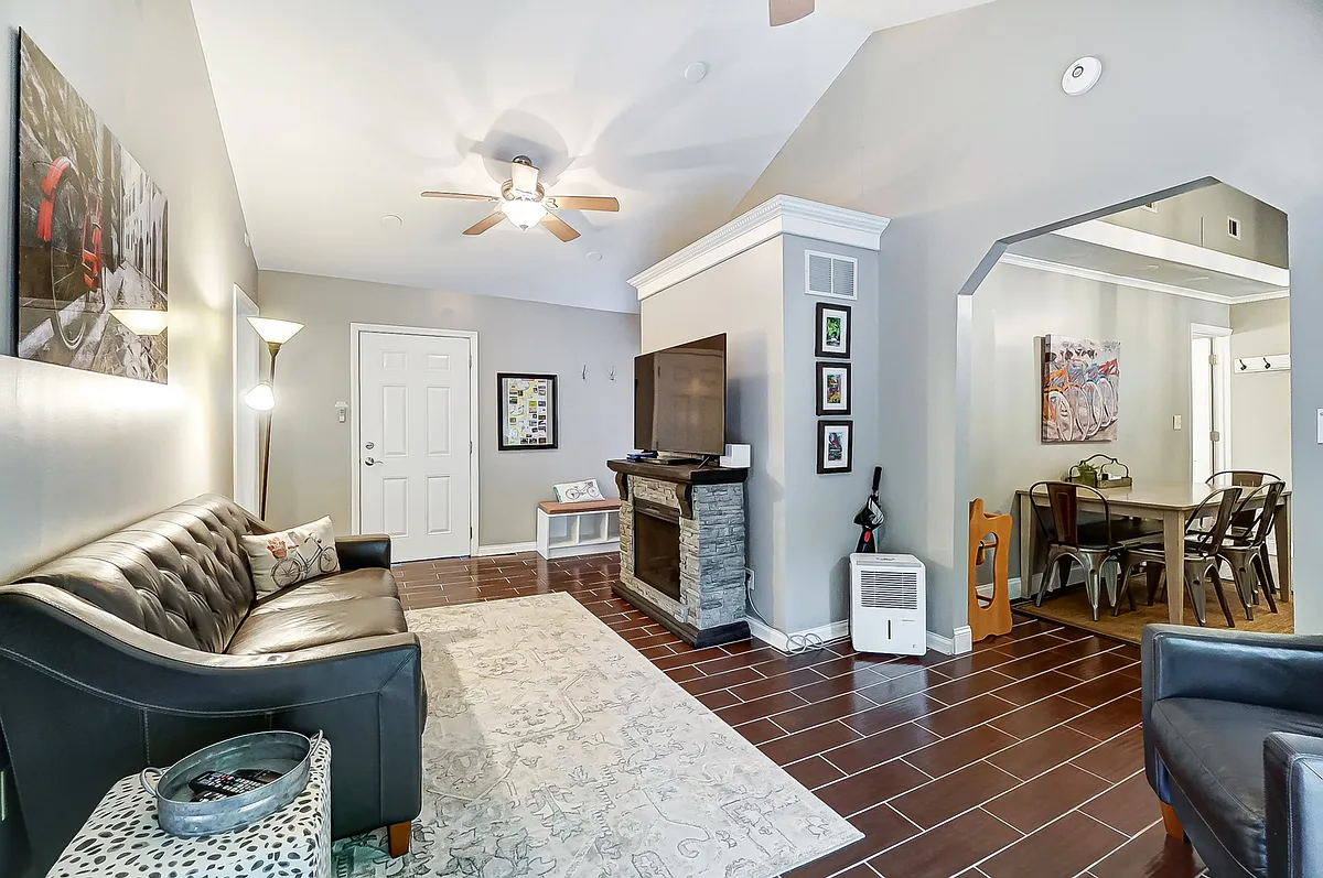 Vaulted ceiling in the family room w/ electric fireplace - Lower River Rd