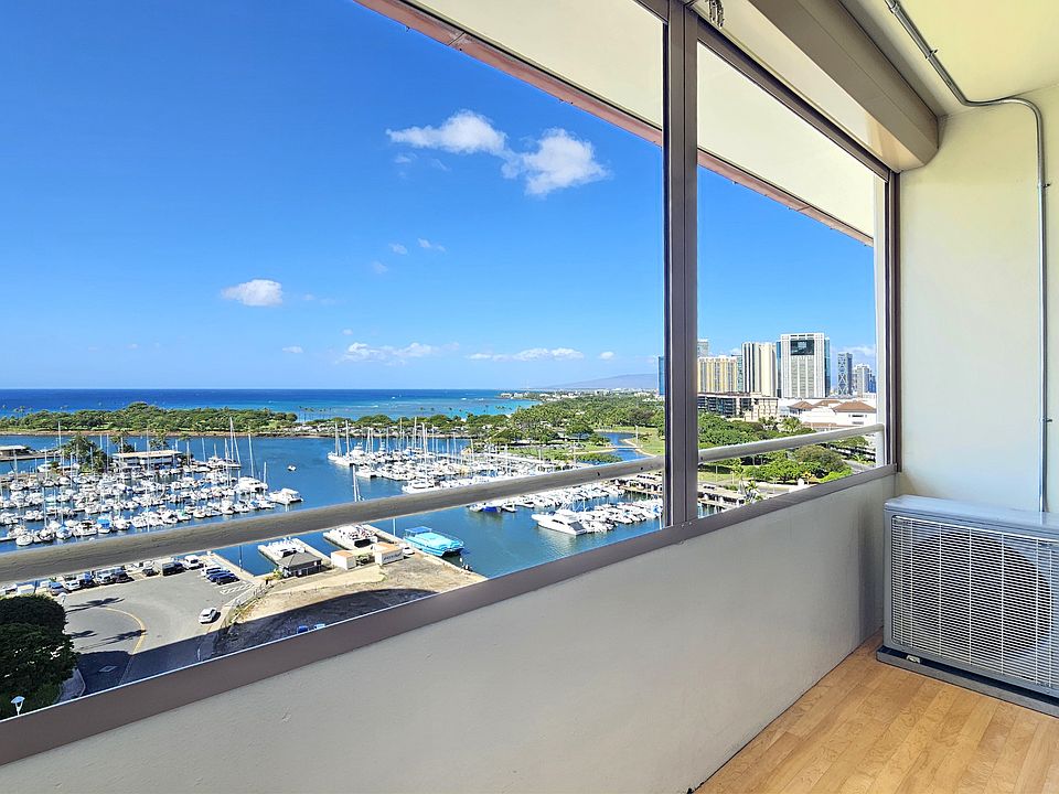South Facing Lanai with storm shutters Look out to the ocean and marina
