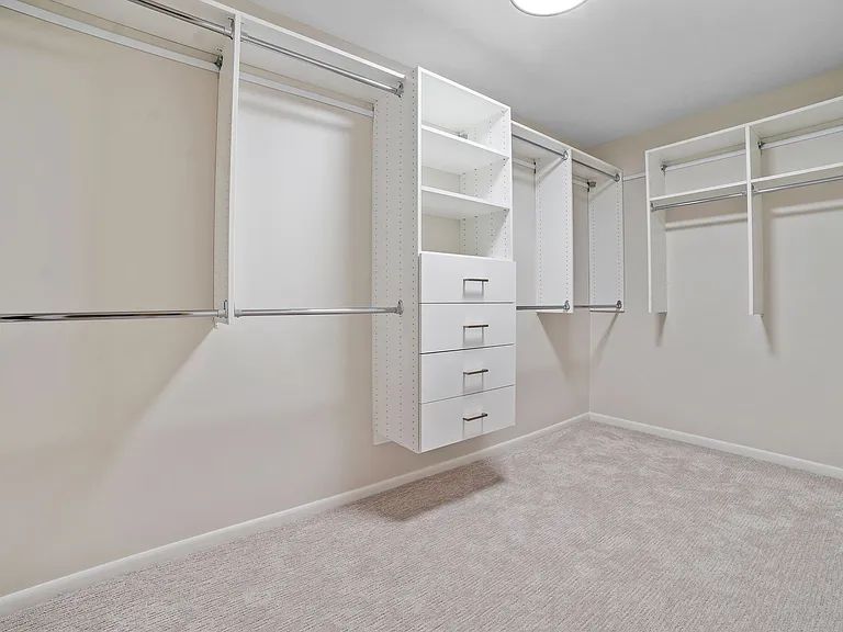 Walk in closet in primary suite