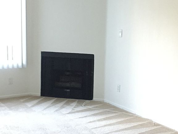 Charming fireplace and tall ceilings