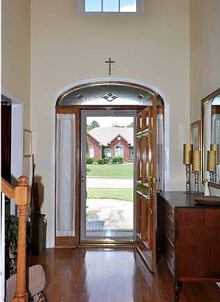 Foyer with hardwood floors