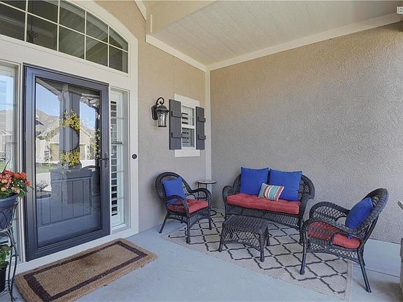 Look how large the front porch is?  Plenty of room for a patio set which creates an inviting conversation space.
