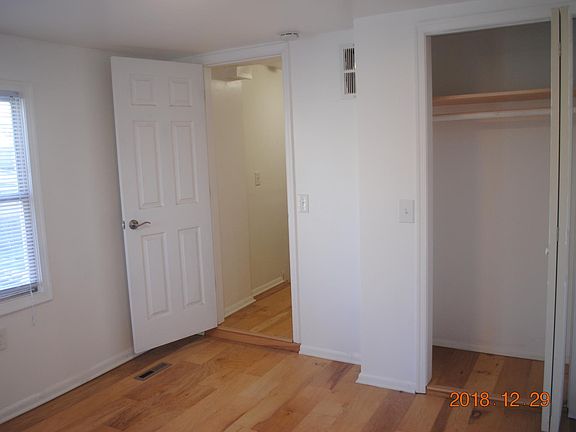 Room w closet and side window