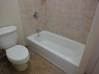 there are four full bathrooms throughout the home plus a powder room on the main level.