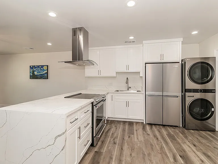 Luxury Kitchen and High End Appliances, LVP flooring, LED lighting.