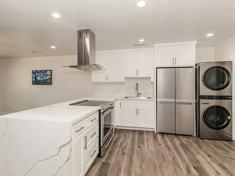 Luxury Kitchen and High End Appliances, LVP flooring, LED lighting.