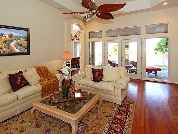 Looking from the fireplace in the Family Room out to the back patio.