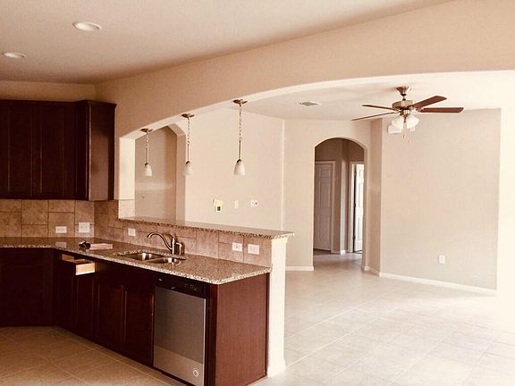 Open-layout living and kitchen area.