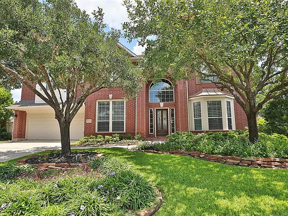 Nestled on a quiet cul-de-sac lot over 1/3 acre.