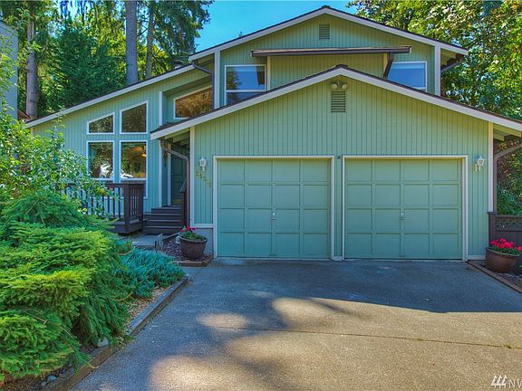 Street View of this great TriLevel, Beautiful Front Yard and Leaf Guard Gutter System.