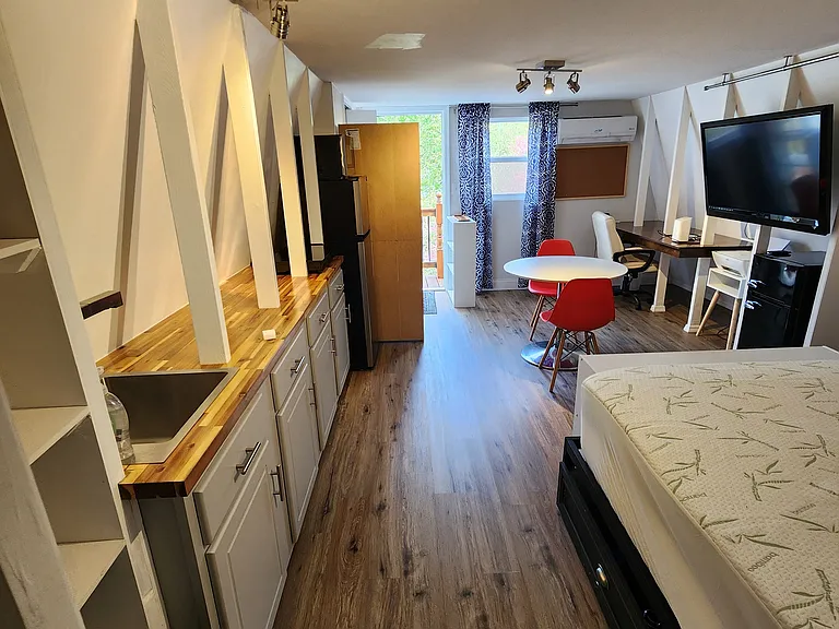 kitchen area to the left desk to the right