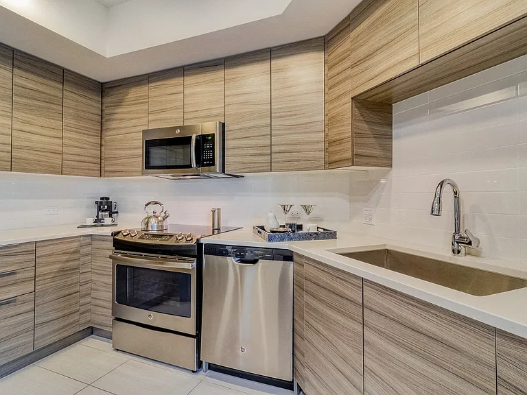 Kitchens are complete with an entertaining island and quartz countertops.
