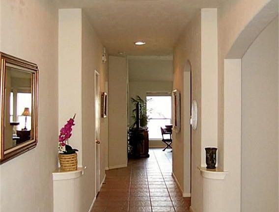 When your guests enter your home, they enter the Foyer with designer tile 10' ceiling throughout and glimpse the Formal Dining and the Family Room down the long Entry Hall