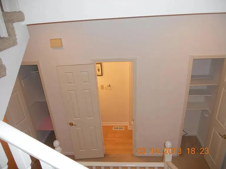 half bathroom on the first floor with 2 closets