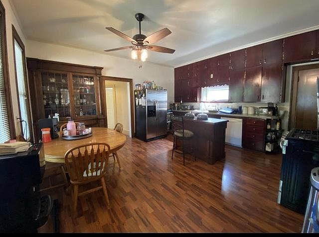 Spacious kitchen with built in cabinets and lots of light